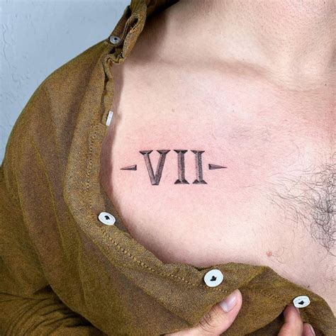 15 Unforgettable Roman Numerals Tattoo Men Chest 15 Unforgettable Roman Numerals Tattoo Men Chest