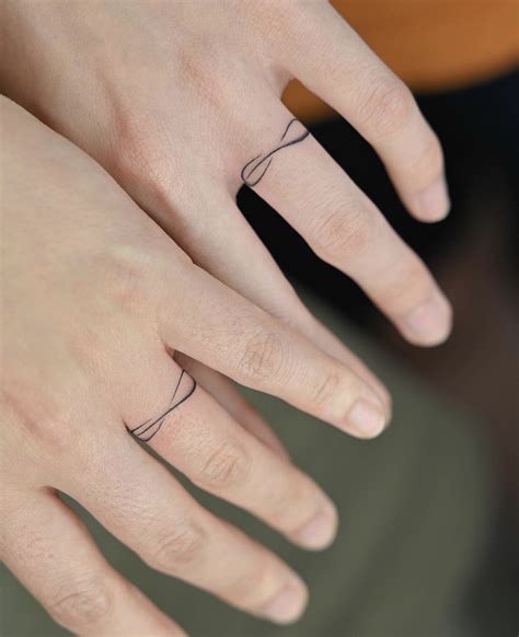 40 Best Wedding Ring Tattoos Love Symbols To Inspire You Artofit 40 Best Wedding Ring Tattoos Love Symbols To Inspire You Artofit
