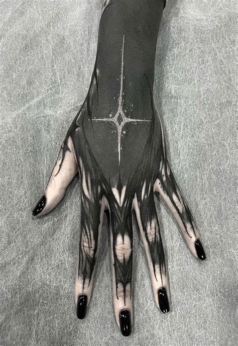 Blackout Hand Tattoo