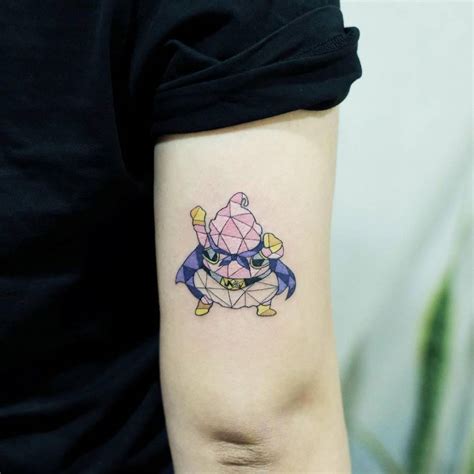 Majin Boo Tattoo On The Tricep Majin Boo Tattoo On The Tricep