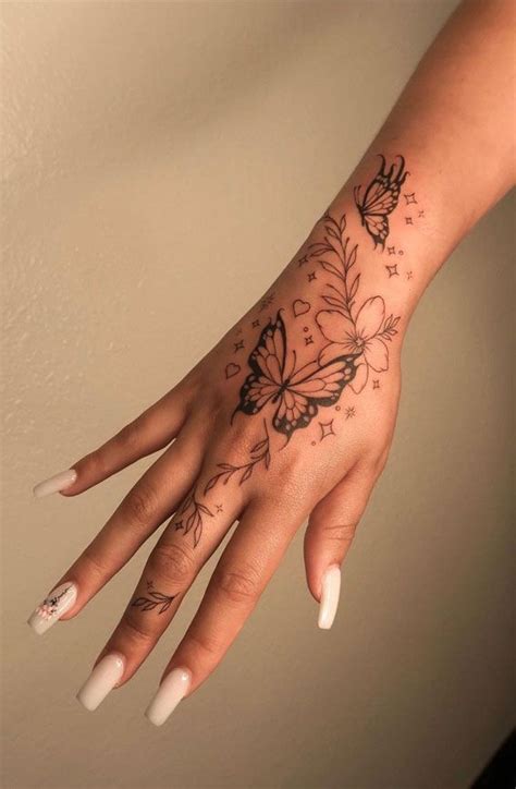 Pin On Tattoos Unique Butterfly Tattoos Hand Tattoos For Girls