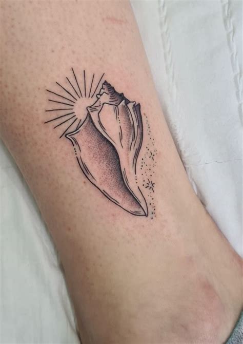 Pretty Conch Shell Tattoo