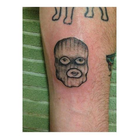 Ski Mask Tattoo Located On The Inner Forearm