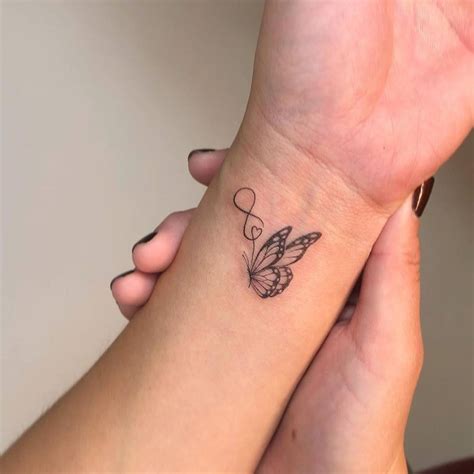 Tattoos For Girls On Wrist In 2025 Butterfly Wrist Tattoo Small
