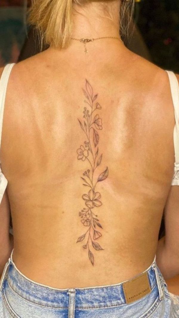 This Beautiful Floral Spine Tattoo Inspired By Her Wedding Bouquet This Beautiful Floral Spine Tattoo Inspired By Her Wedding Bouquet