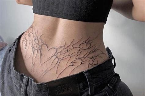 Tramp Stamp Tattoo History Modern Trends And Design Ideas Vean Tattoo